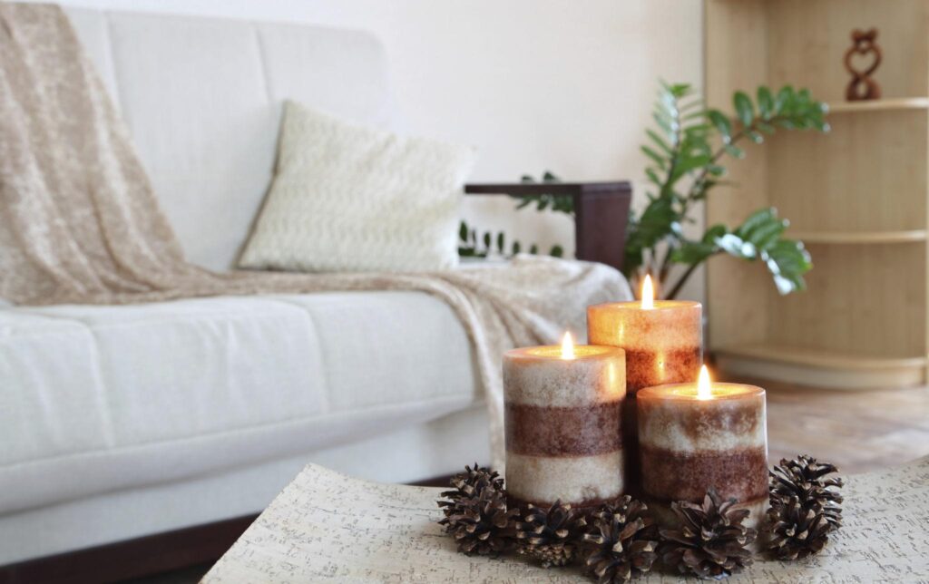 Warm candle setup creating a cozy home atmosphere